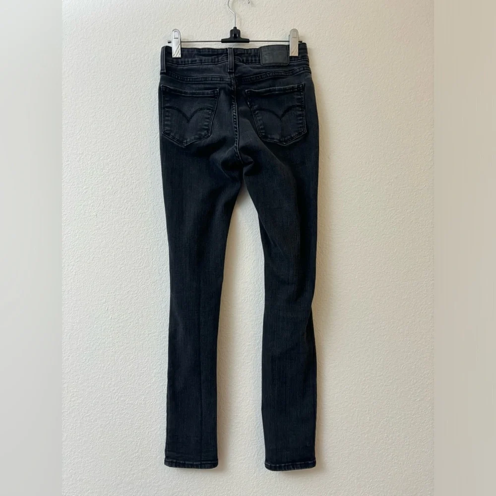Levi’s 711 skinny black distressed‎ low rise jeans 26 ripped holes